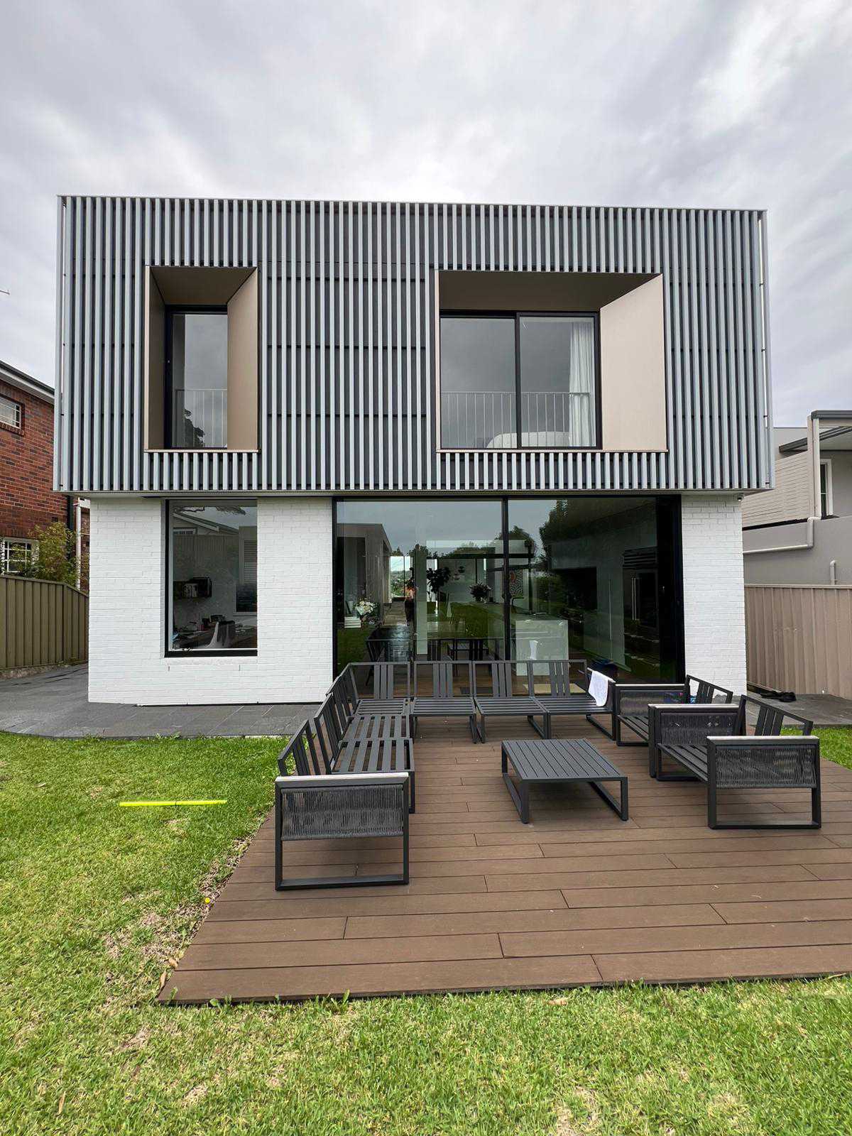 Clean windows on a modern two-storey home